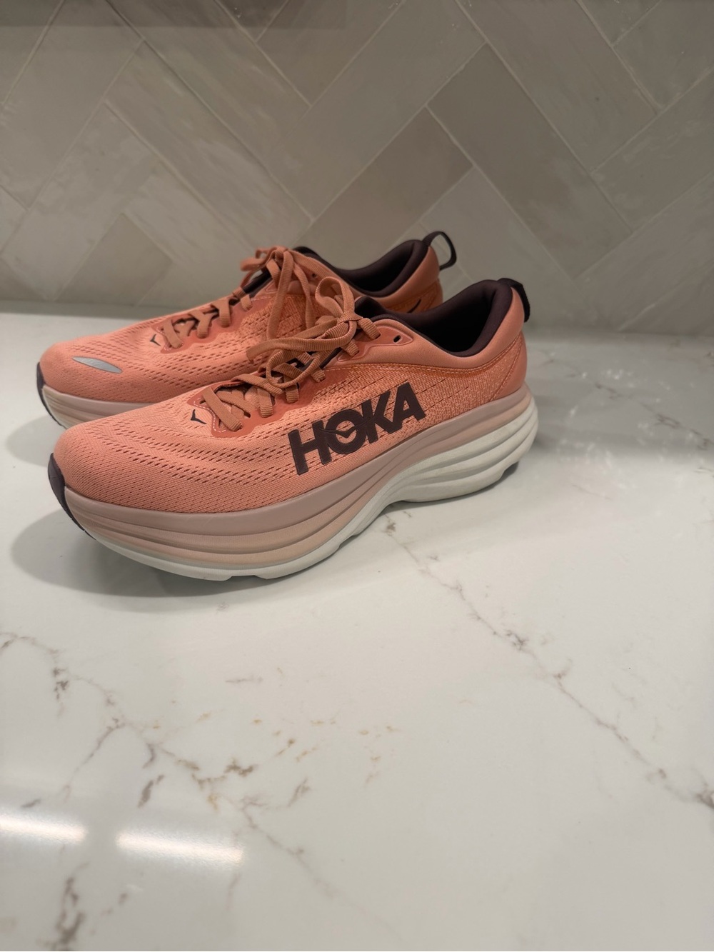 HOKA Women's Athletic Shoes in Peach Coral with Dark Maroon Logo 9.5
